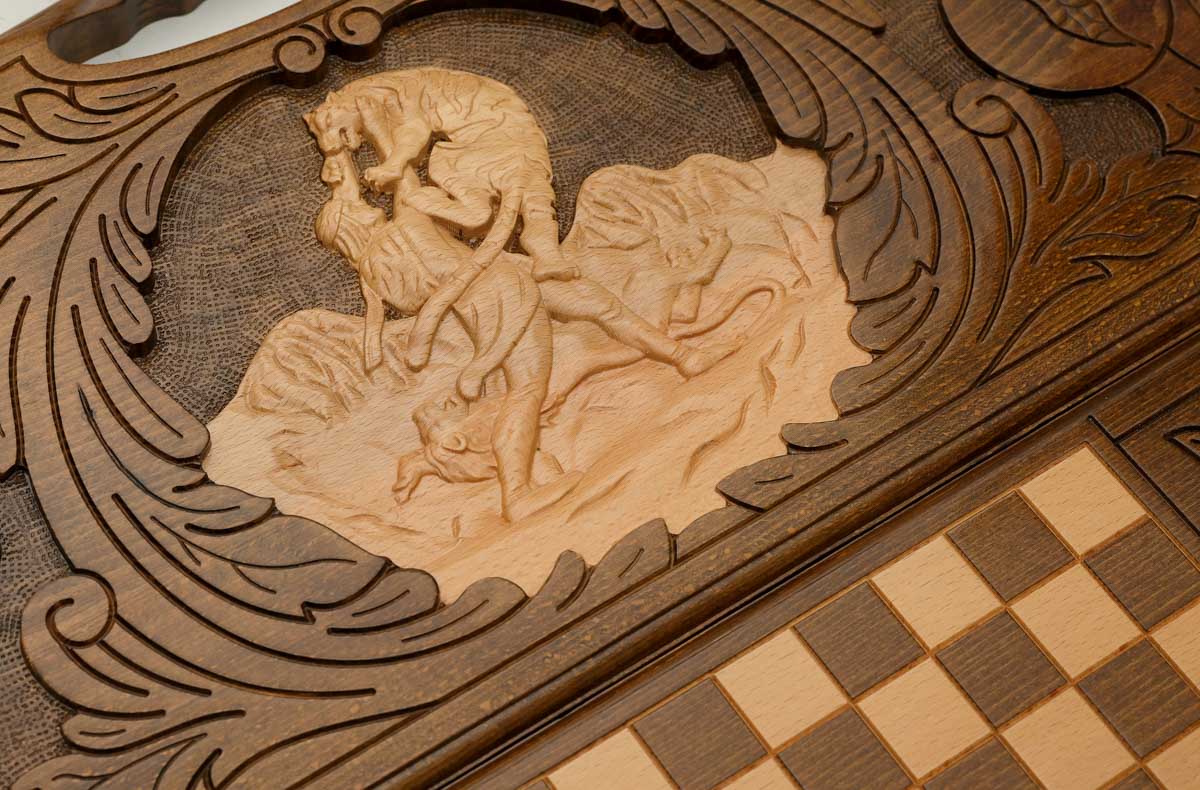 The backgammon board opened to show the wooden playing surface