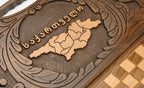 The backgammon board opened to show the wooden playing surface