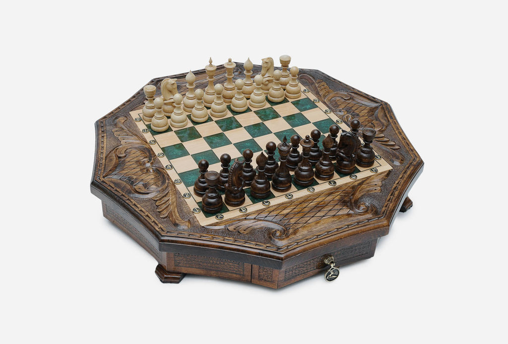Full octagonal green-epoxy chess board with light and dark wood pieces in starting position