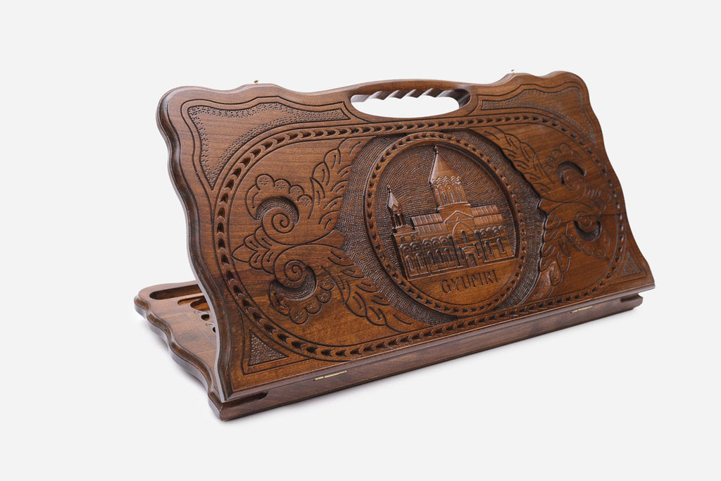 Carved beechwood backgammon board with the Holy Saviour Church medallion and a carry handle, shown propped open