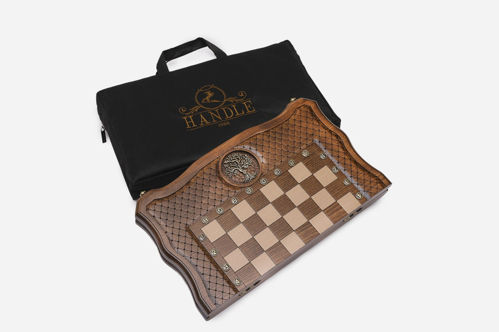 The folded chess and backgammon set packed with its branded Handle carry bag