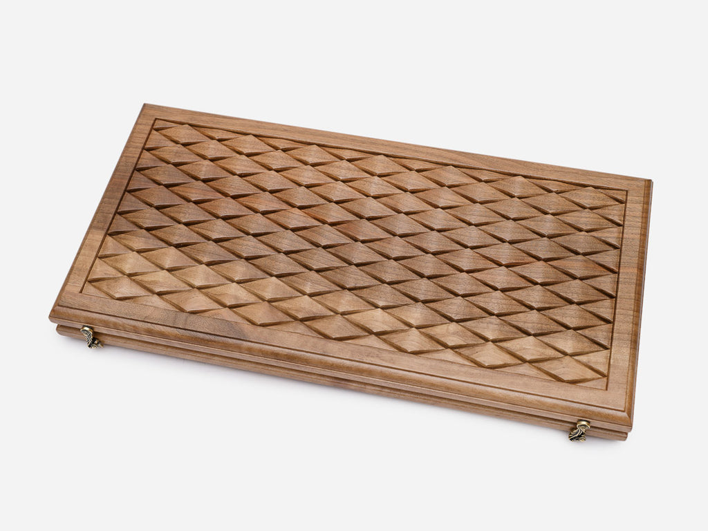 Angled view of the diamond engraved backgammon board