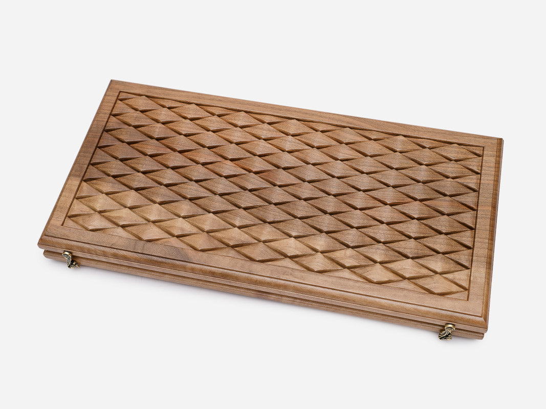Angled view of the diamond engraved backgammon board