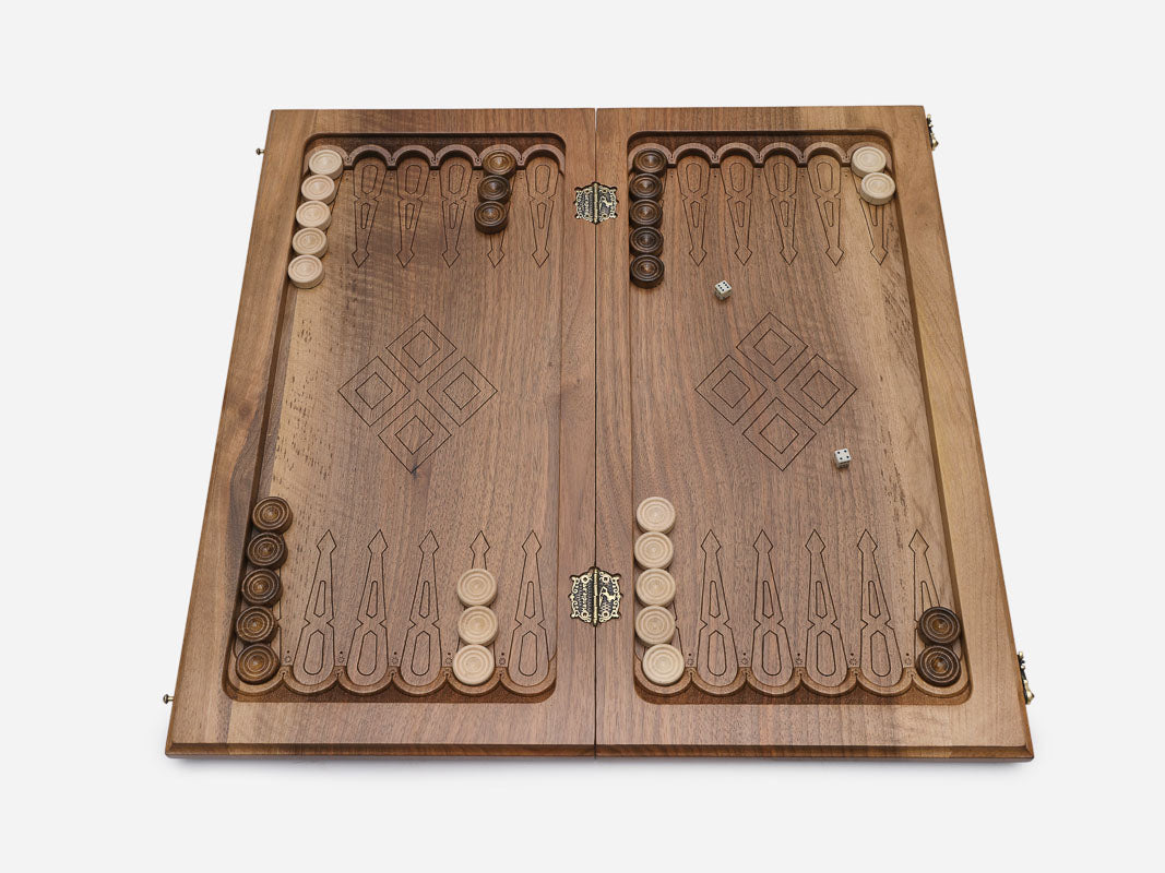 Close-up of the walnut grain and diamond engraving