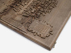 The backgammon board opened to show the wooden playing surface