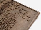 Detail of the inscribed panels beneath the tree
