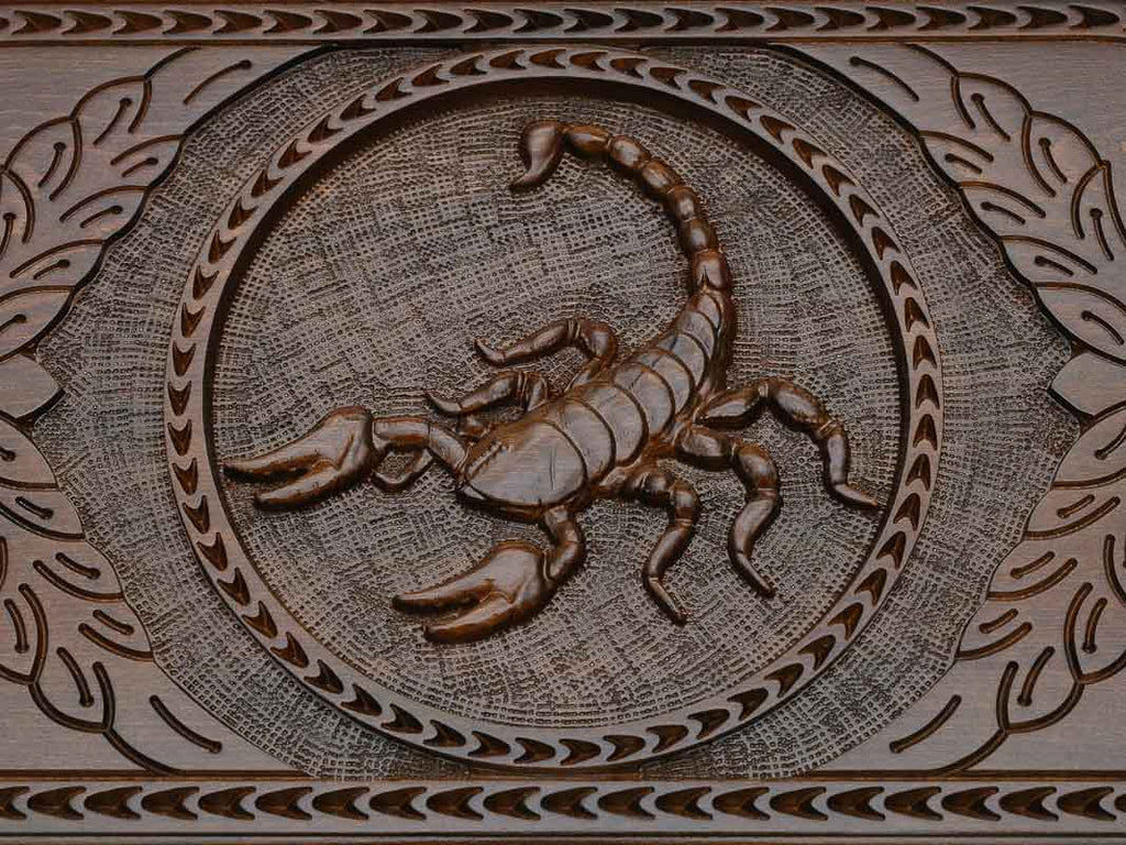 Detail of the scrollwork beside the medallion