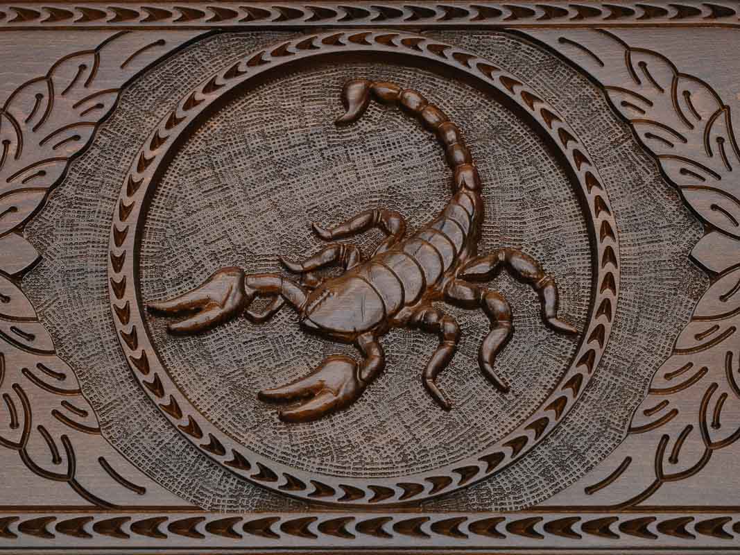 Detail of the scrollwork beside the medallion