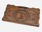 Angled view of the pomegranate carved backgammon board