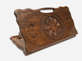 Carved beechwood backgammon board with a snowflake ornament medallion and a carry handle, propped open