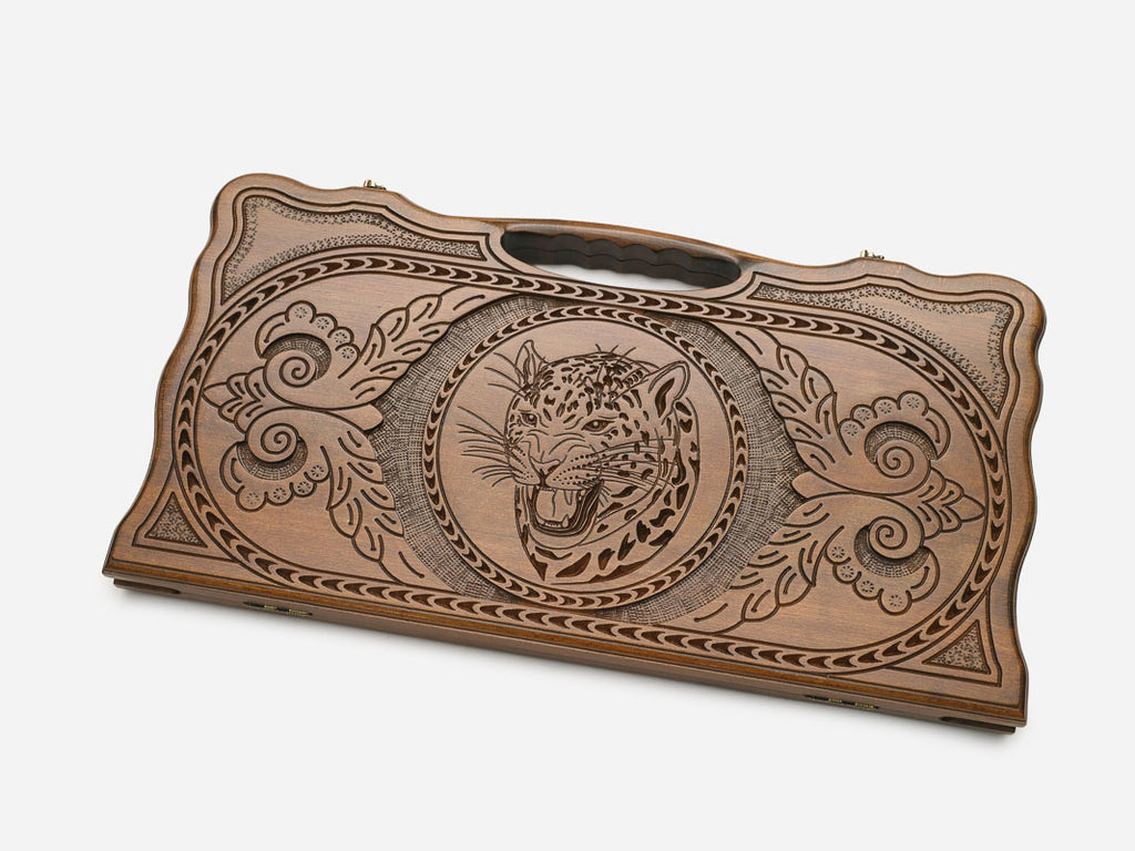 Angled view of the lynx carved backgammon board