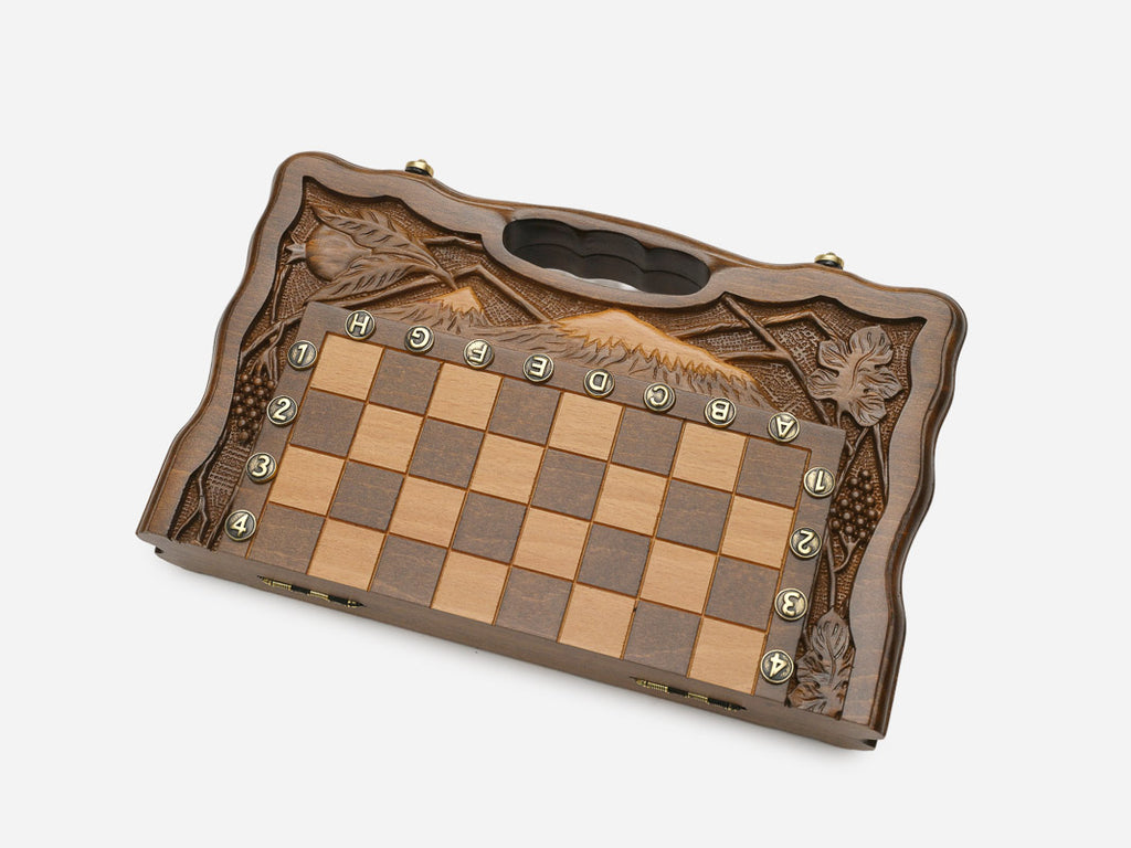 Folded walnut chess and backgammon board showing the carved Mount Ararat frame