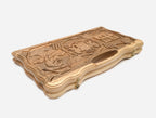 Side view of the carved walnut board
