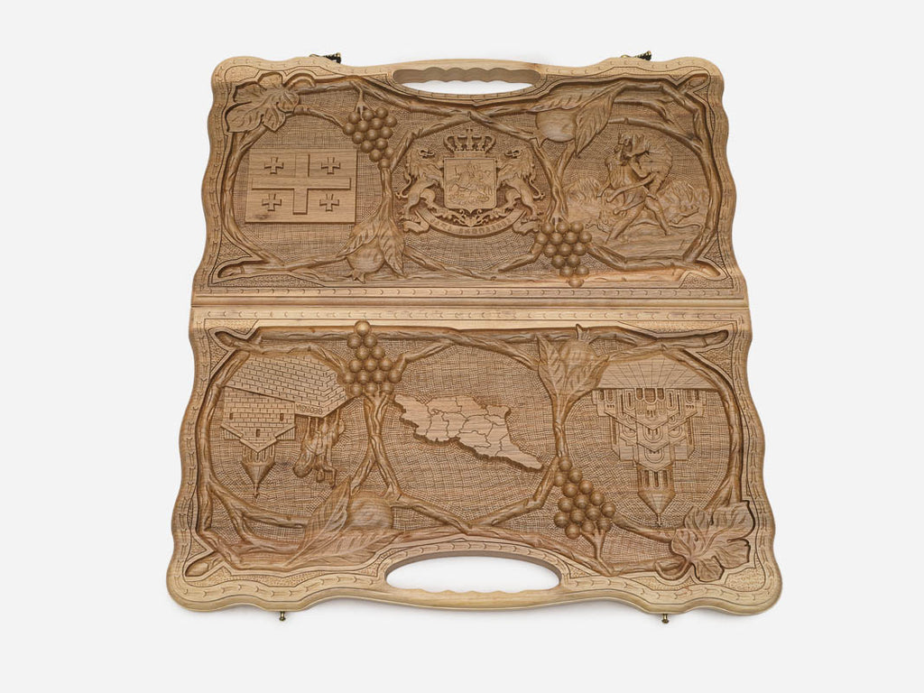 The carry handle and upper vine carving