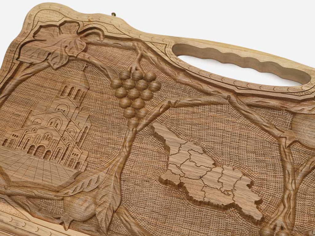 The backgammon board opened to show the wooden playing surface
