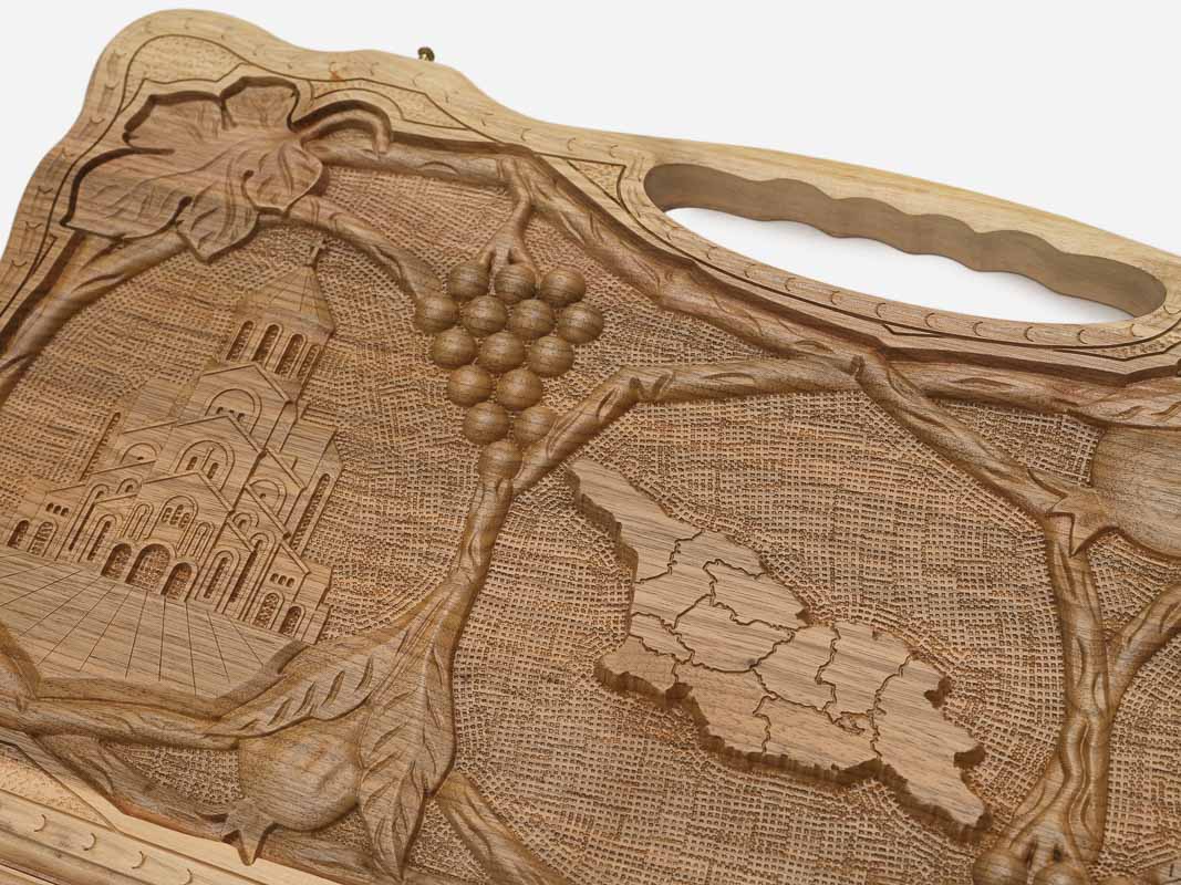 The backgammon board opened to show the wooden playing surface