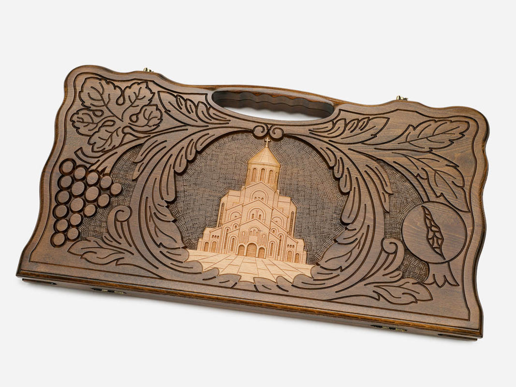 Angled view of the Holy Trinity Cathedral carved backgammon board