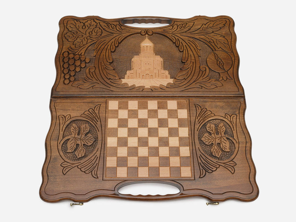 The carry handle and upper vine carving