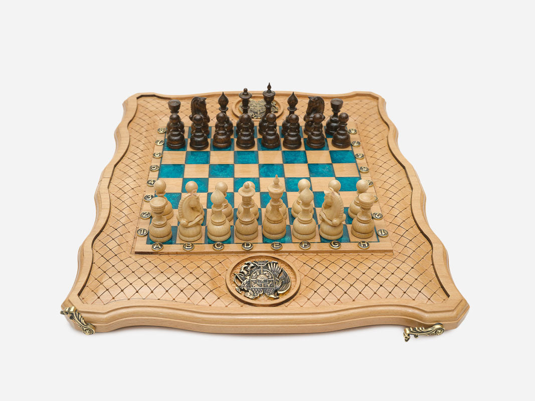 Detail of the dark walnut chess pieces on the epoxy board