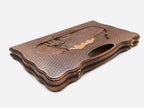 The backgammon board opened to show the wooden playing surface