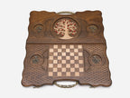 Detail of a smaller bronze tree medallion set in the carved field