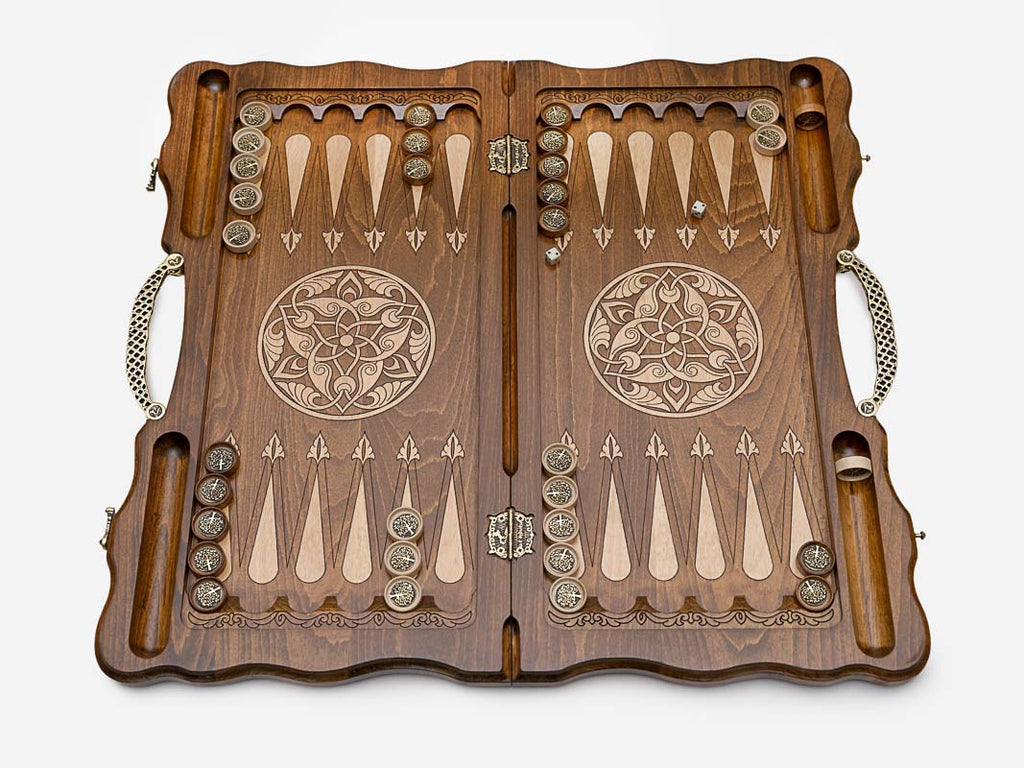 The backgammon board opened to reveal the wooden playing points