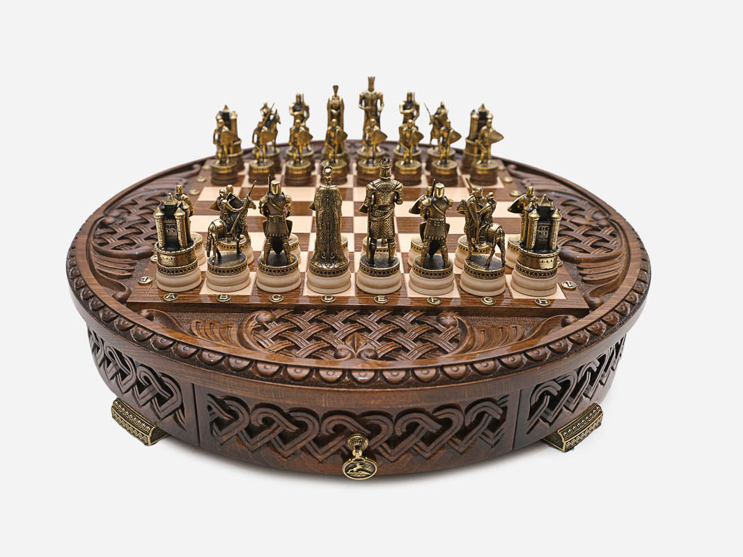Handle Chess Royal Circle round board set up for play, front angled view with Celtic knot carved rim