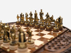 Close-up of the castle rook piece beside the standing knight figures