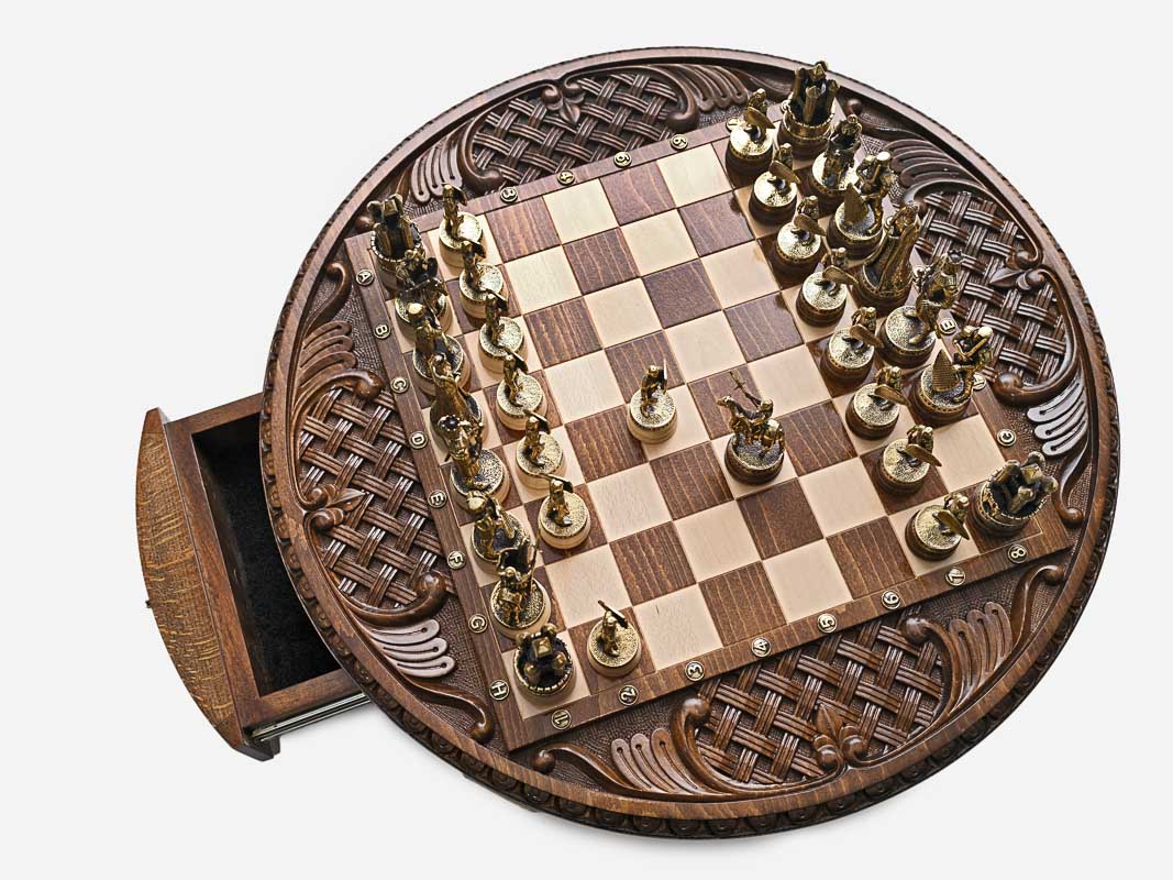 Handle Chess Royal Circle top-down view with pieces set up and drawer open