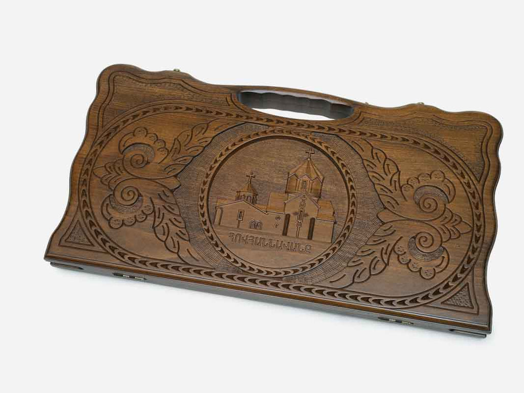Carved beechwood backgammon board with the Hovhannavank monastery in a central medallion and a carry handle, shown closed