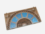 Close-up of the carved central relief and epoxy panels
