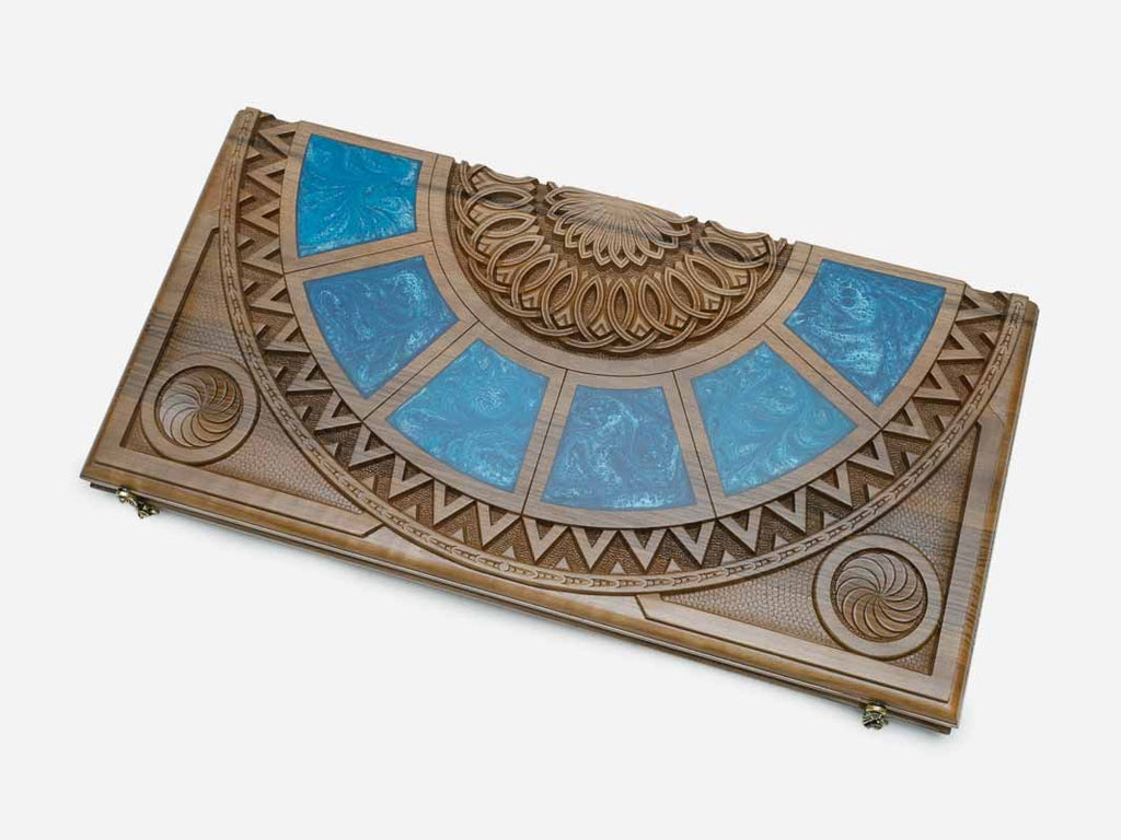 Angled view of the green and teal epoxy backgammon board