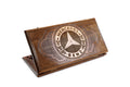 A frontal shot of the closed Mercedes-Benz classic backgammon board featuring the hand-carved three-pointed star.
