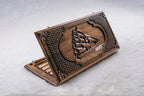 Hand-carved sailboat design on walnut backgammon set