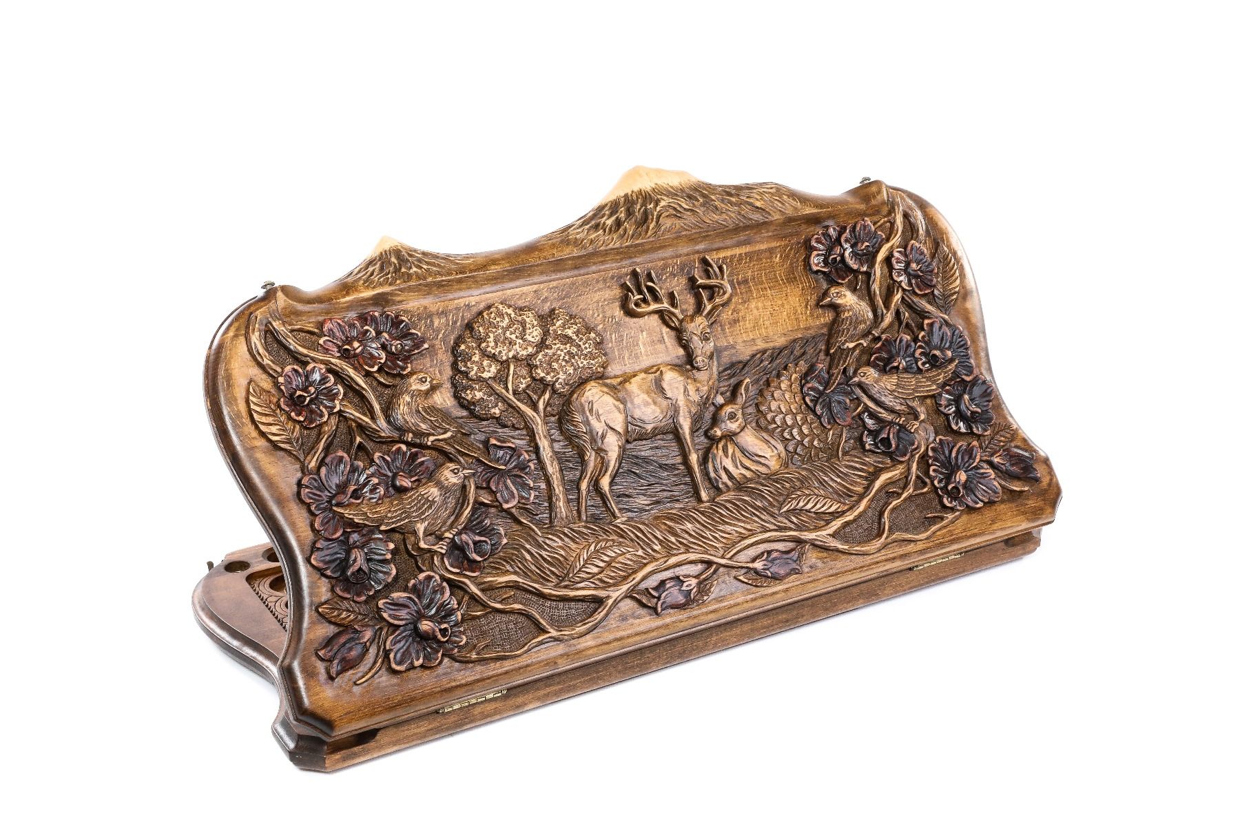 A frontal shot of the closed Deer backgammon board showing the detailed high-relief carving within the Mount Ararat outline.