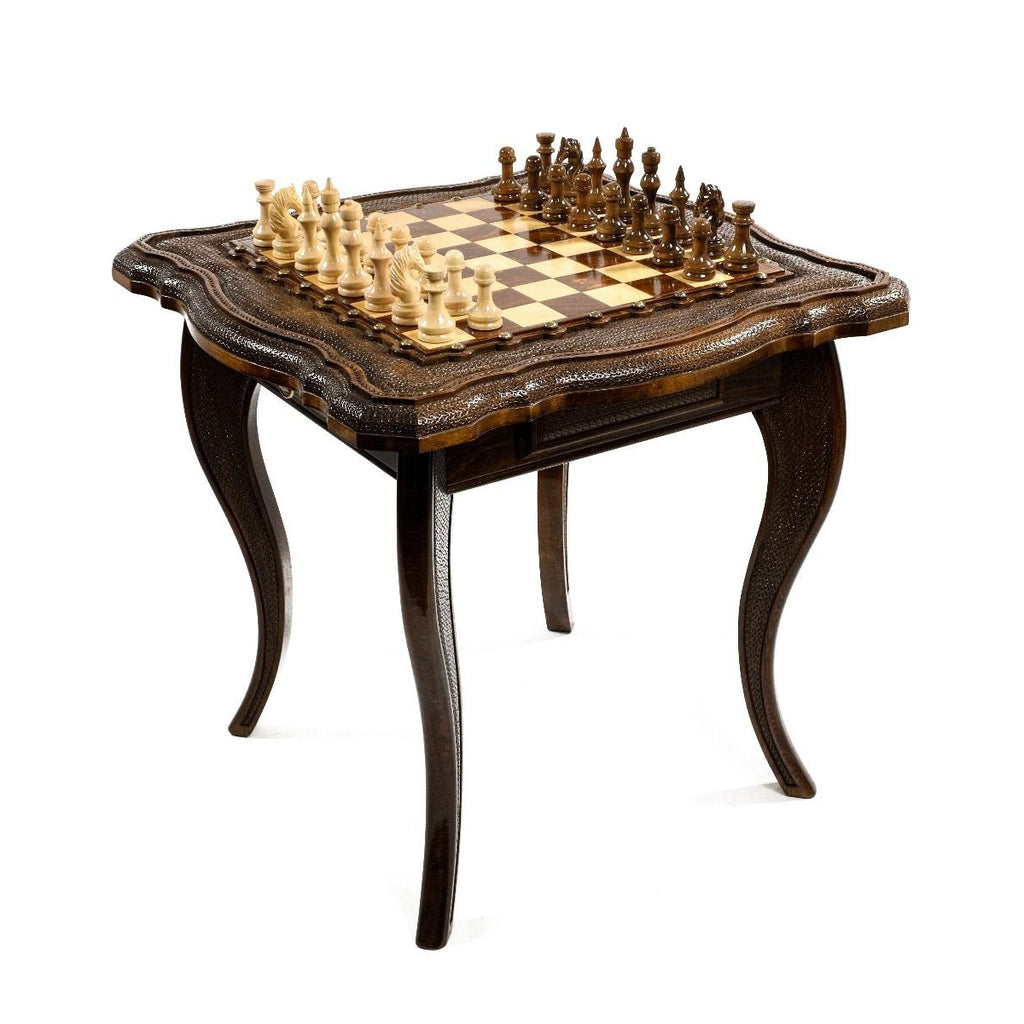 Overall view of the hand-carved wooden chess table showcasing the intricate carvings by Hrachya Ohanyan.
