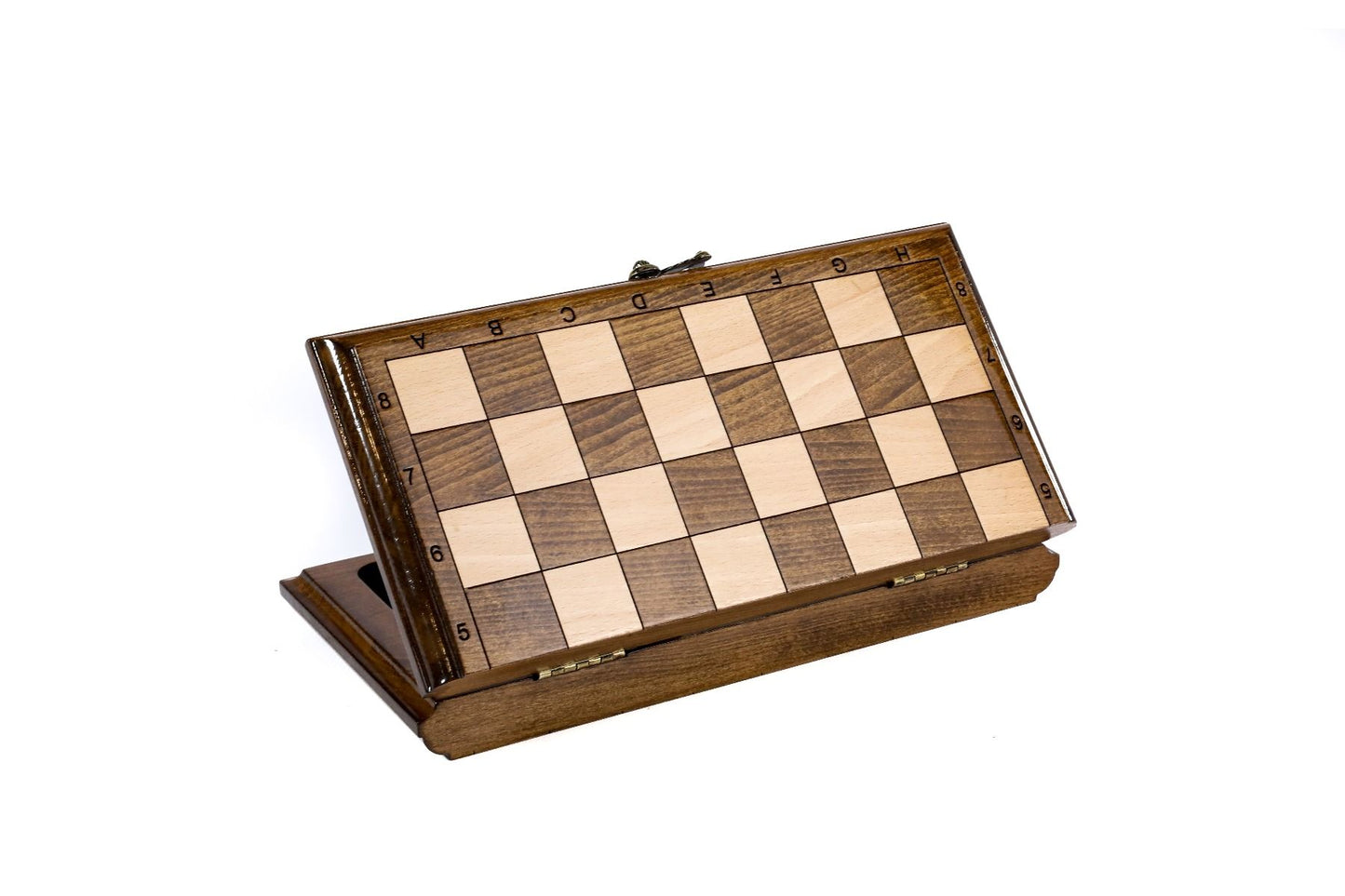 Chess board setup with traditional handcrafted pieces
