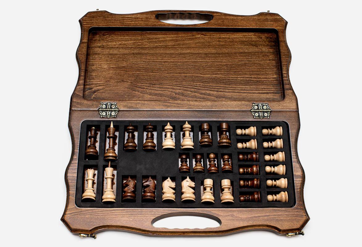 Overhead view of the chessboard and the full set of pieces