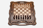Folding walnut chess board with carved scrollwork borders, a Mount Ararat inlay and beech and walnut pieces in starting position