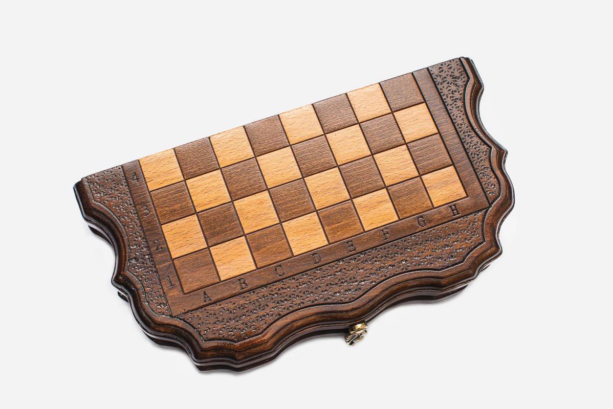 Sculpted-Edge chess set shown folded with carry handle