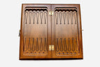 Classic chess and backgammon set shown folded with carry handle