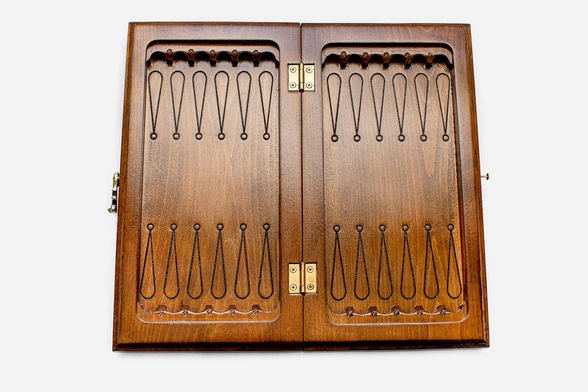 Classic chess and backgammon set shown folded with carry handle