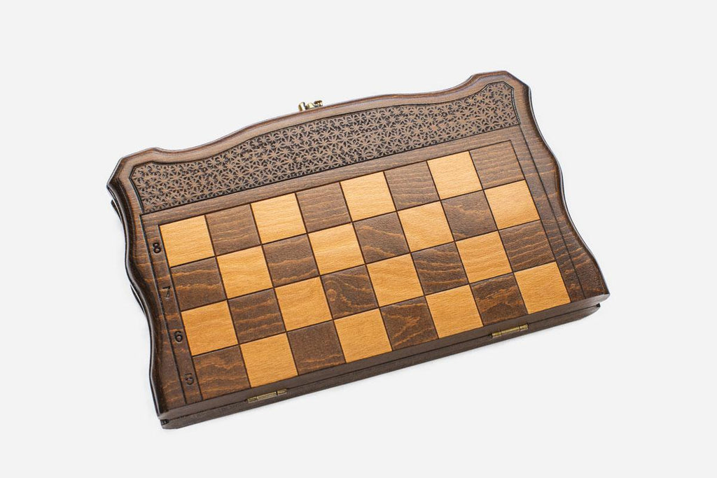 Classic chess and backgammon set shown folded with carry handle