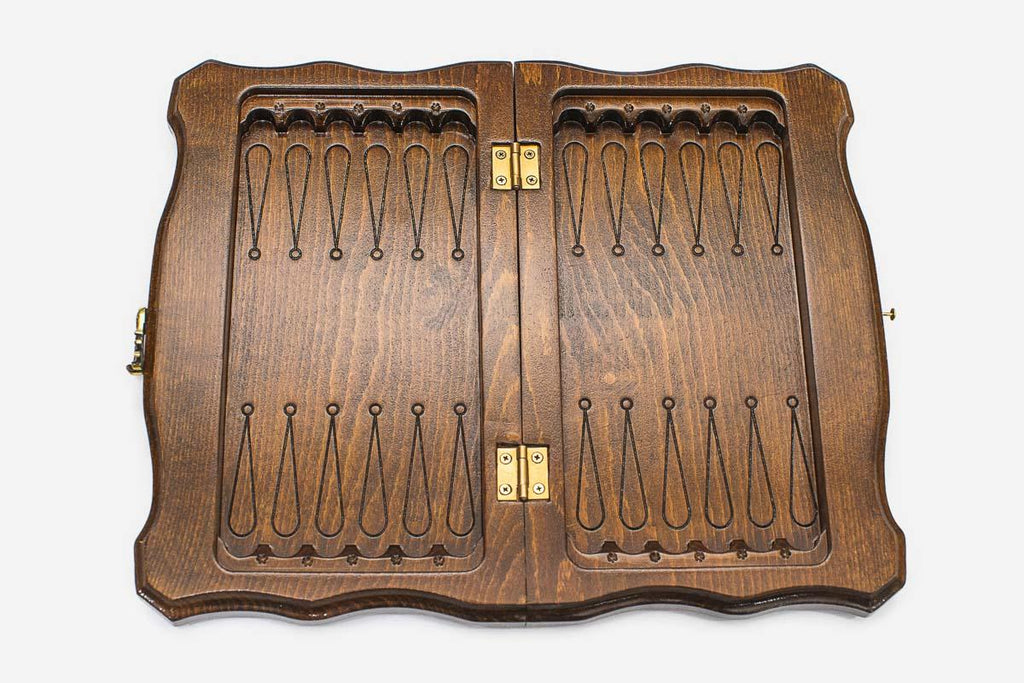 Close-up of a classic carved border carving on the beech board