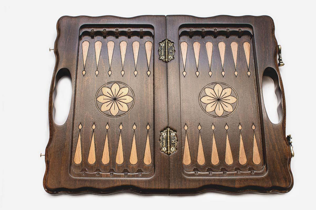Lattice chess and backgammon set shown folded with carry handle