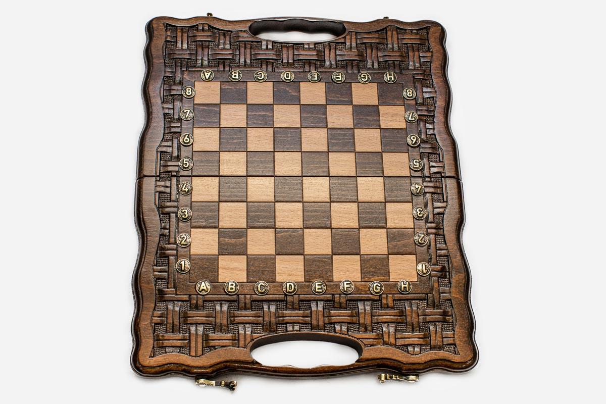 Close-up of a lattice design carving on the beech board