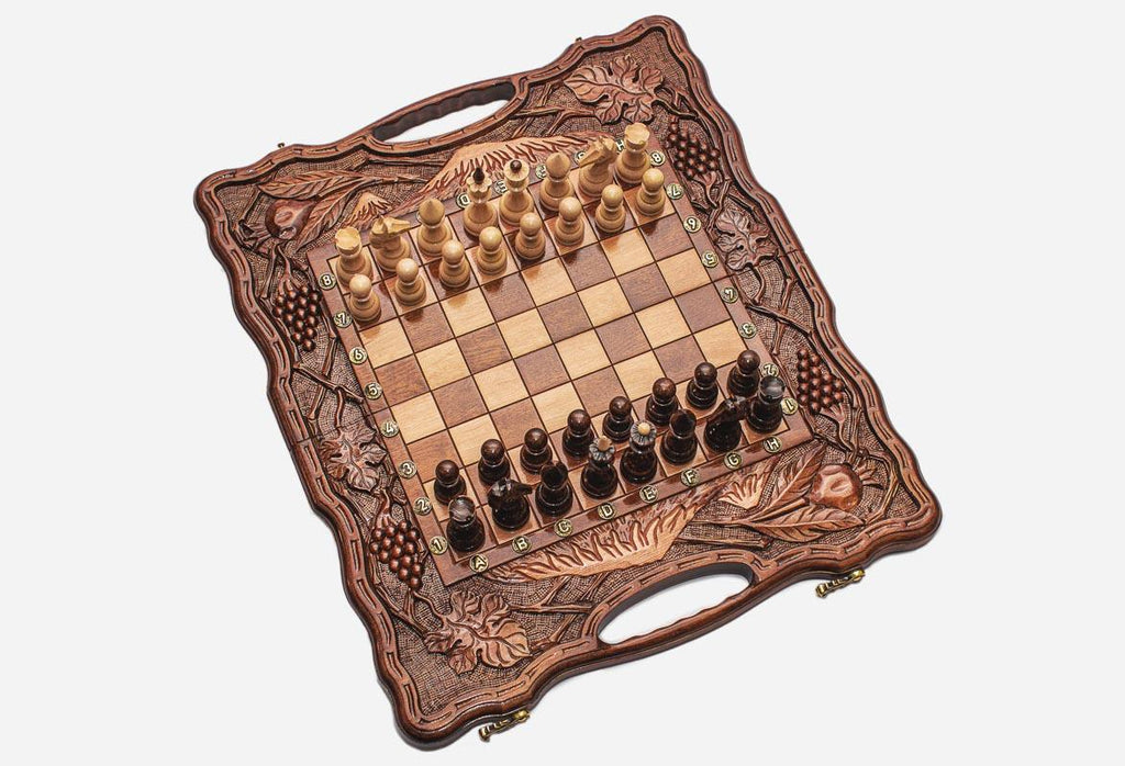 Overhead view of the chessboard and the full set of pieces