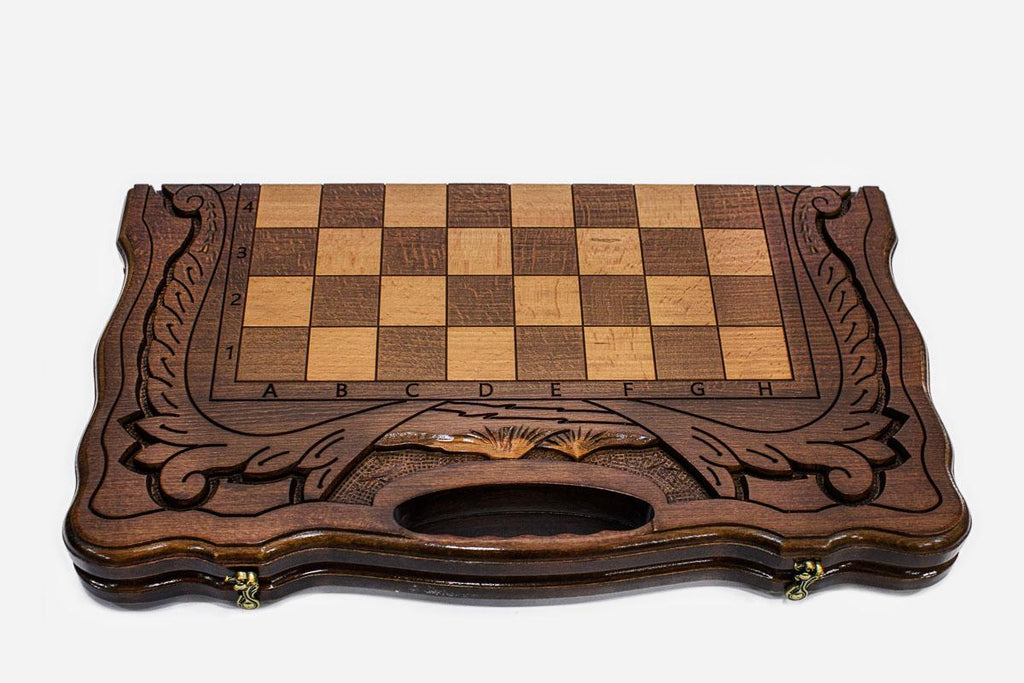 Close-up of the beech and walnut chess pieces on the inlaid squares