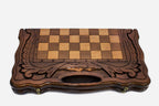 Close-up of the beech and walnut chess pieces on the inlaid squares