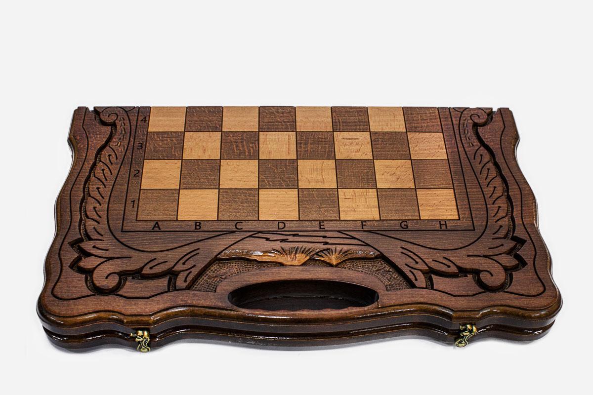 Close-up of the beech and walnut chess pieces on the inlaid squares